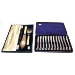 A cased set of twelve silver handled tea knives and a cased silver and ivorine fish service