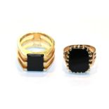 An onyx ring, stamped '9CT', finger size Q1/2; and another signet ring, unmarked, finger size P.