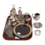 A tray of assorted silver, including: a French silver beaker, maker's mark poorly struck, probably