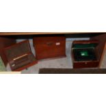 An Edwardian oak cased stationary box and two fitted jewellery boxes