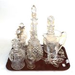 A pair of silver mounted decanters, and other glass decanters, etc