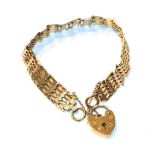 A 9 carat gold gate link bracelet, length 18.5cm . Gross weight 15.6 grams