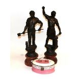 Pair of spelter figures and a biscuit box