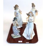 Four Lladro figures ''Butterfly treasures'', Travelling companions'', ''Aroma of the islands''