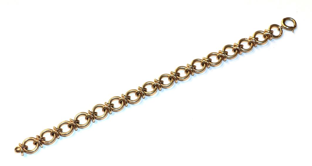 A fancy link bracelet, stamped '9CT', length 18cm. Gross weight 22.1 grams.