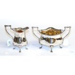 A George V silver cream-jug and sugar-bowl, by Fattorini and Sons Ltd., Birmingham, 1911, each of