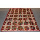 19th century log cabin pattern patchwork quilt, incorporating wools and cotton flannels with a red