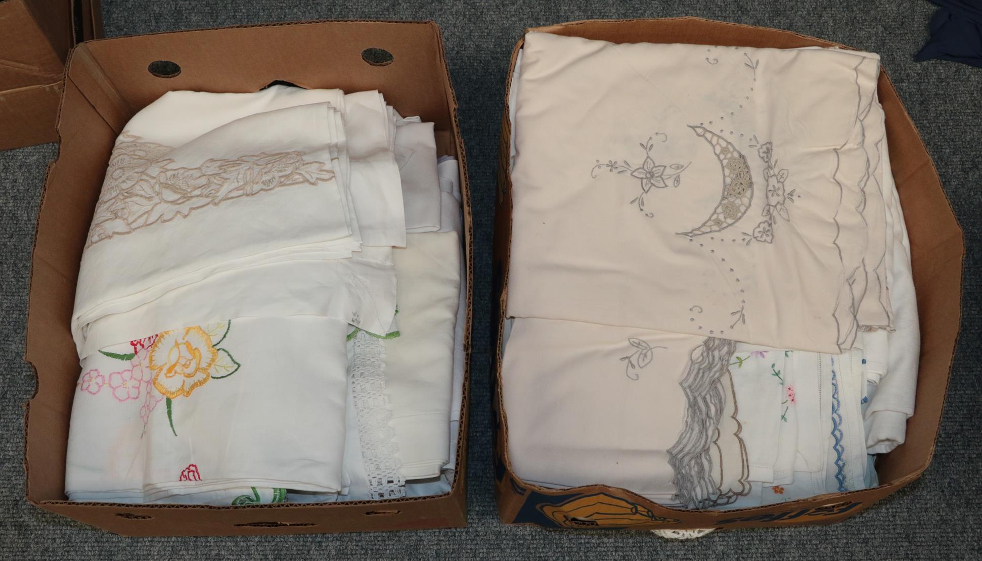 Assorted linens and cottons comprising embroidered bed covers, other bed linen, table linen etc (two