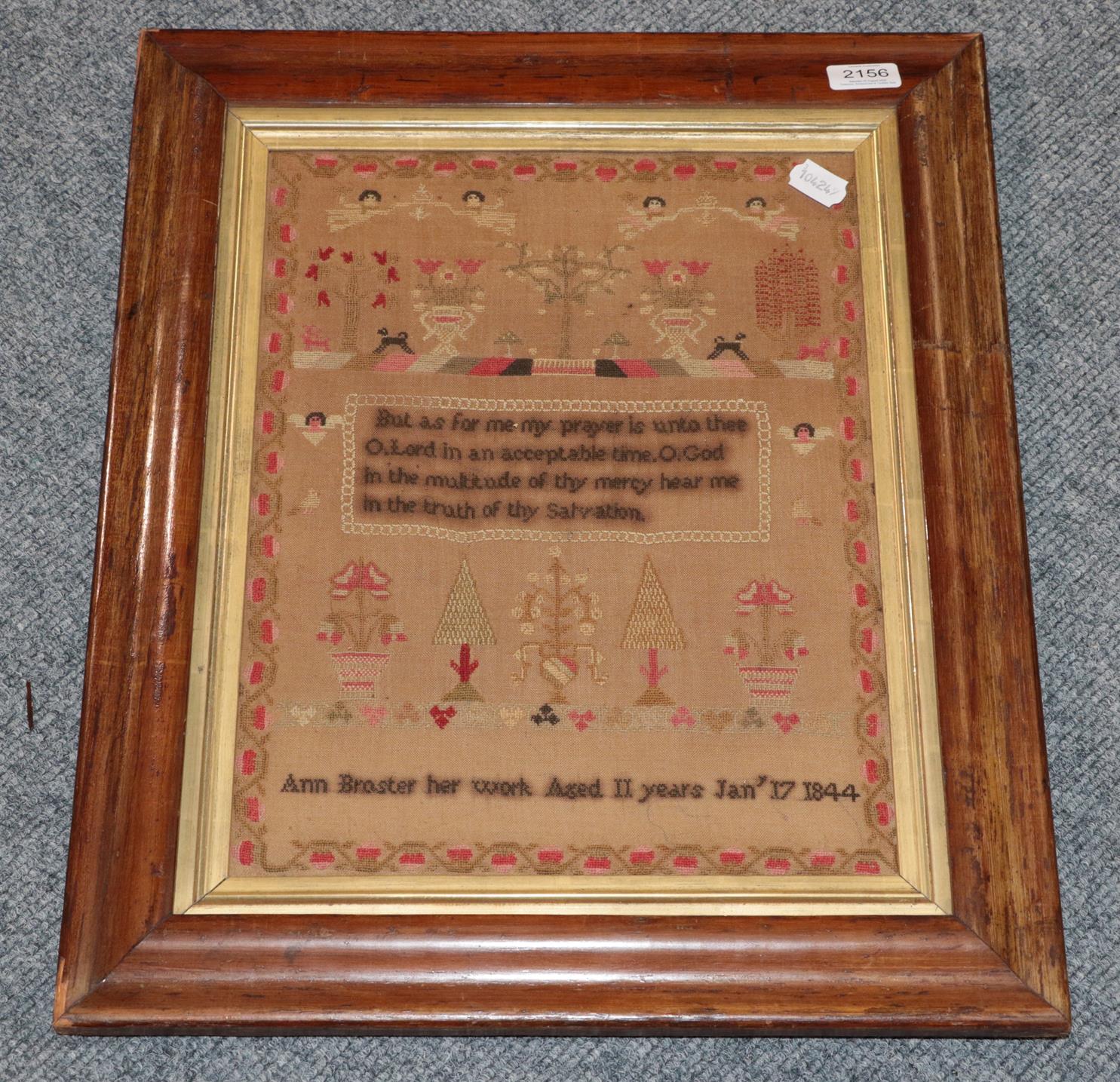 Framed sampler worked by Ann Broster, aged 11 year, January 17th 1844, decorated with central