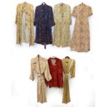 Early 20th Century Chinese Brocade Dressing Robes and Others, including two similar robes on a
