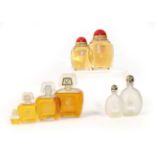 Three Graduated Sets of Loewe Advertising Display Dummy Factices, comprising four 'Aire' bottles,