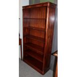 A reproduction free standing bookcase with adjustable shelves