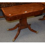 A Regency mahogany fold over games table