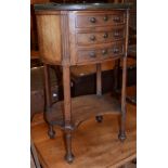 A French marble topped oval bedside chest of drawers with brass gallery