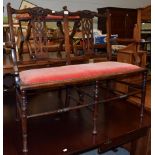 A late Victorian walnut two seater sofa