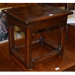 A reproduction oak coffee table