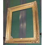 A 19th century gilt and gesso frame 122cm by 100cm