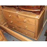 A 19th century pine four-drawer chest