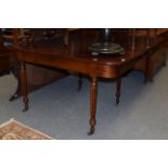 An early 19th century mahogany dining table in the manner of Gillows