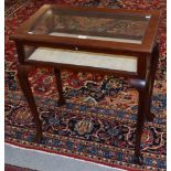 A glazed mahogany bijouterie table