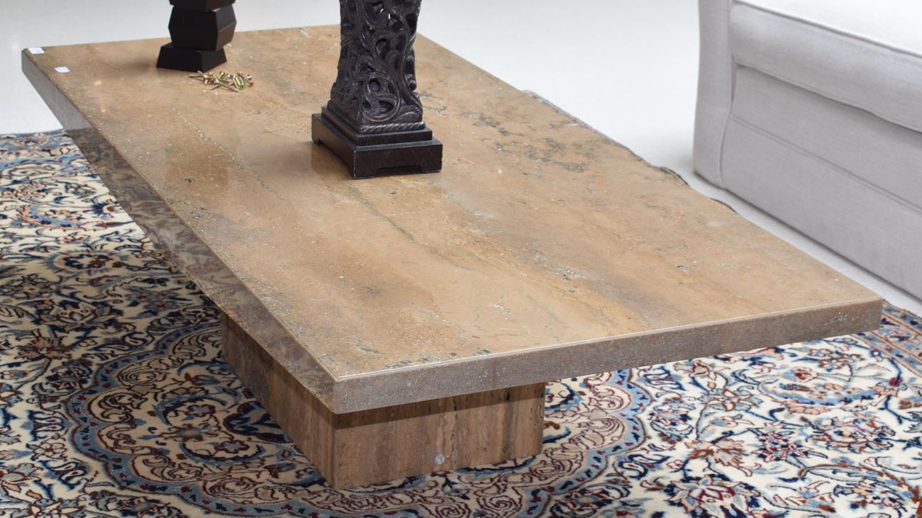 A travertine coffee table, retailed by Barker & Stonehouse, 150cm wide