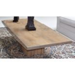 A travertine coffee table, retailed by Barker & Stonehouse, 150cm wide