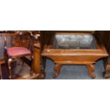 An Edwardian mahogany and inlaid corner armchair with a lead lined planter