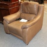A Polo Divani brown leather electric reclining armchair
