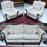 A good quality mahogany framed four-piece lounge suite upholstered in cream floral fabric