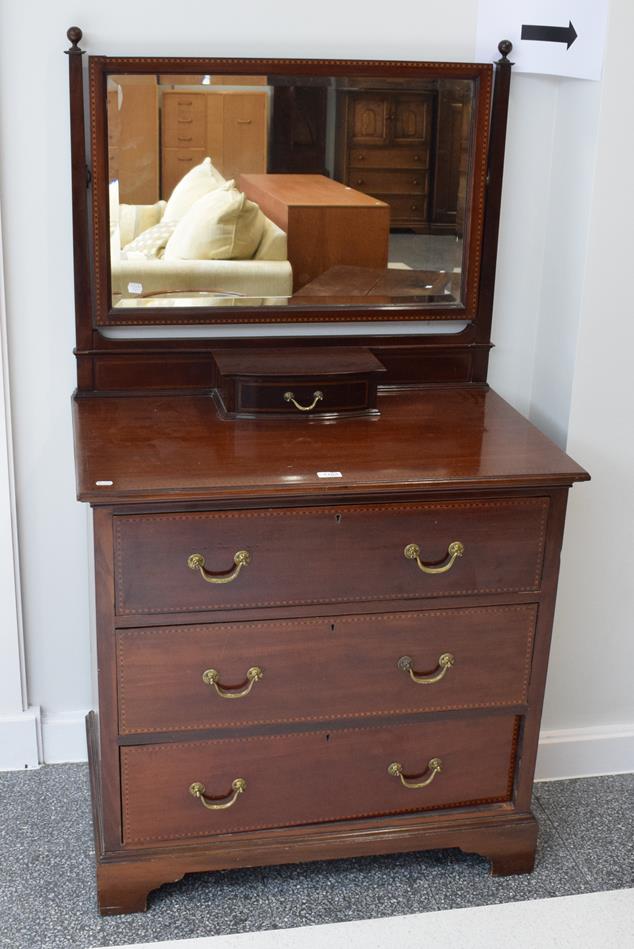 An Edwardian inlaid mahogany mirrored dressing chest