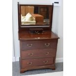 An Edwardian inlaid mahogany mirrored dressing chest