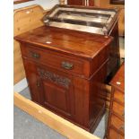 An Edwardian carved walnut wall mounted display cabinet and a late Victorian walnut cupboard