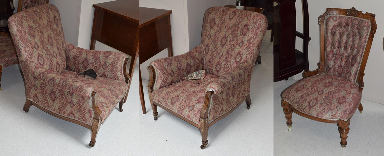 A pair of inlaid mahogany Edwardian upholstered armchairs, together with a similarly upholstered