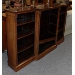 A late 19th century walnut break front bookcase, 182cm wide