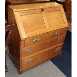 An early 20th century oak bureau