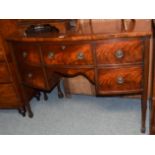 A reproduction mahogany bow fronted sideboard