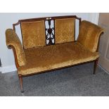 An Edwardian inlaid mahogany sofa