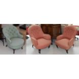 A pair of Victorian mahogany framed button back tub chairs upholstered in contrasting pink and green