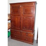 A late 18th century oak and pine lined linen press, with two short and one long drawer