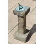 A sundial on square section stone