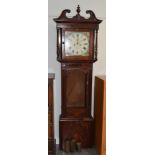 A Victorian mahogany eight day long case clock with square painted dial bearing an inscription, T.