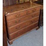 A 19th century oak four-height chest of drawers