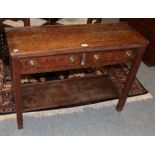 A 19th century oak dresser base of small proportions