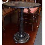 A Victorian ebonised mother-of-pearl inlaid circular pedestal table