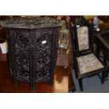 A Victorian carved and ebonised hall chair, and a late Victorian carved and folding occasional table