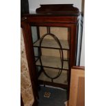 An inlaid mahogany display cabinet