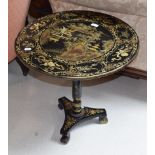 A Chinoiserie gilt and lacquered tilt-top circular occasional table