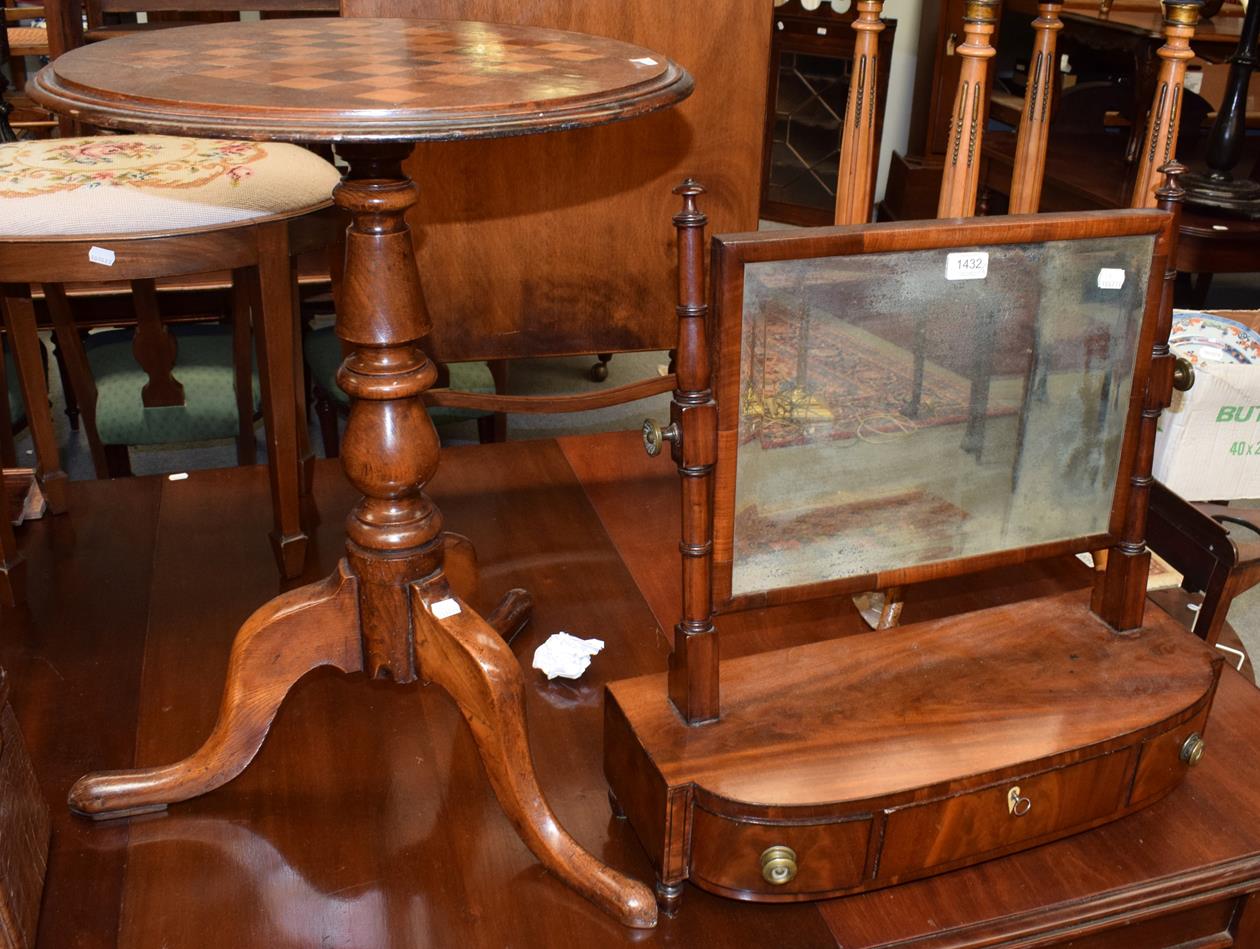 A 19th century mahogany toilet mirror and a 19th century elm tripod table with games board top (2)
