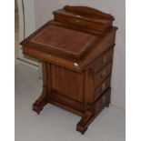 A 19th century mahogany Davenport