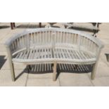A curved garden bench
